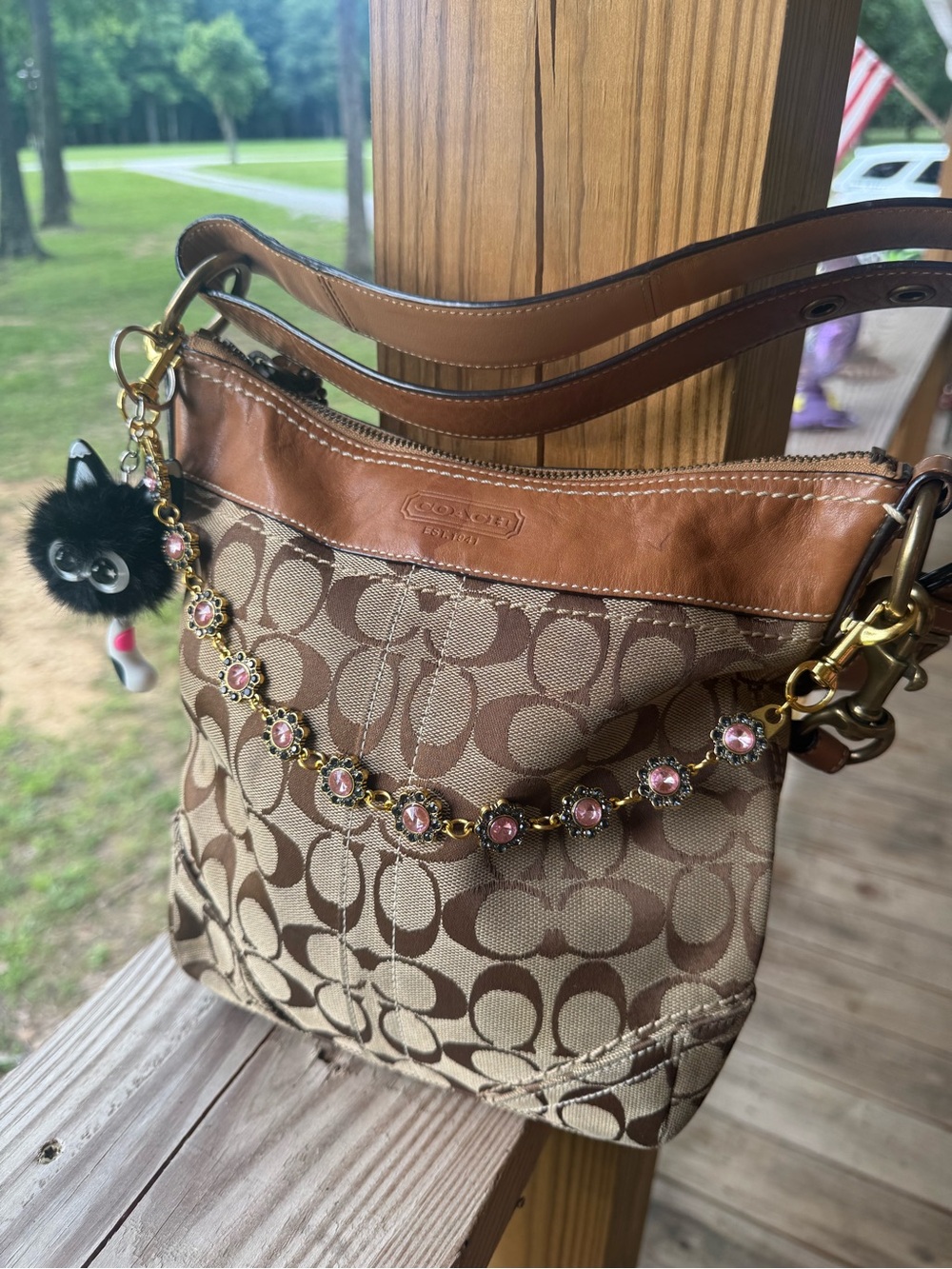 Coach Brown Signature Canvas Shoulder Bag with Tan Leather Trim and Pink Charm